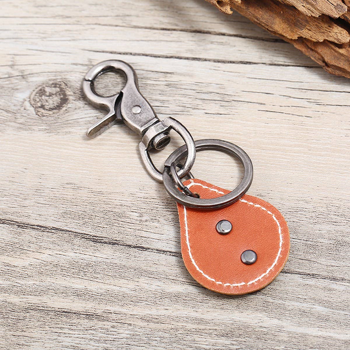 VINTAGE MEN'S BRONZE ALLOY COWHIDE KEYCHAIN