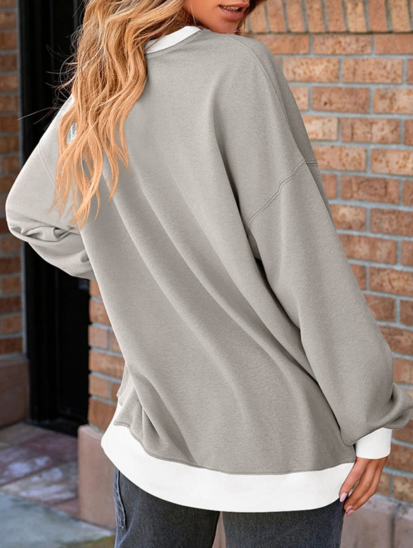 Contrast color splicing round neck sweater