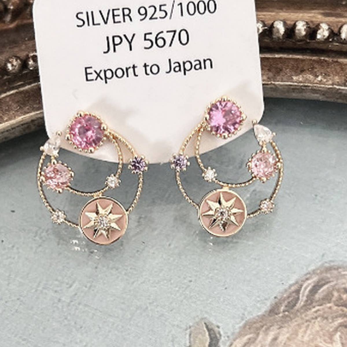 HOLLOW ZIRCON STAR EARRINGS