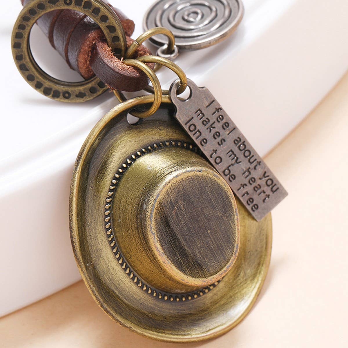 VINTAGE ALLOY COWBOY HAT COWHIDE KEYCHAIN