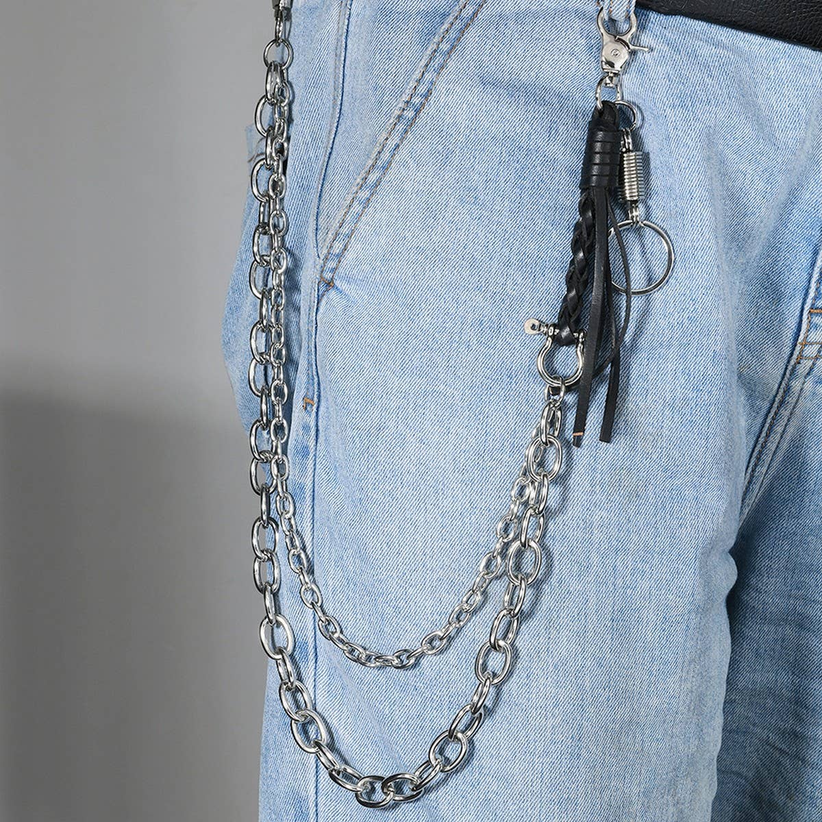 FASHIONABLE COWHIDE BRAIDED TASSEL PANTS CHAIN