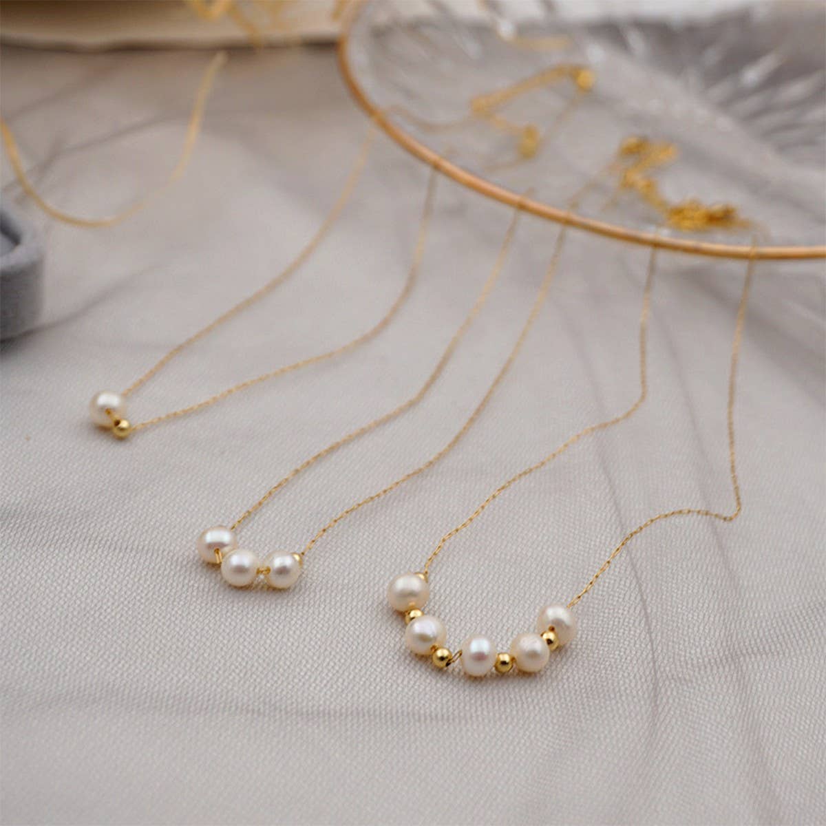 SMALL TEMPERAMENT PEARL CLAVICLE NECKLACE_CWAJE1669