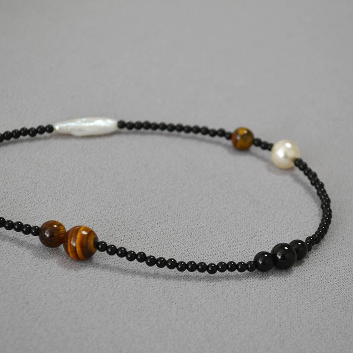 VINTAGE STITCHING ASYMMETRICAL BEADED NECKLACE