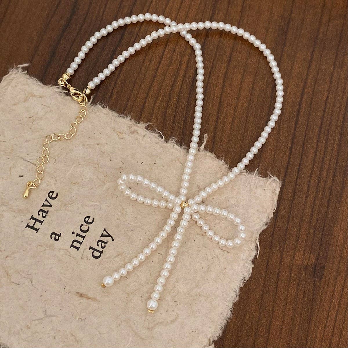 VERSATILE AND HIGH-END SWEET STYLE BOW NECKLACE