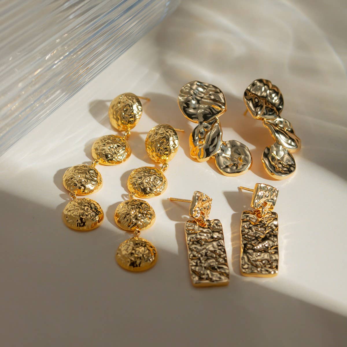 NICHE TEMPERAMENT HAMMER EARRINGS_CWAJE1799