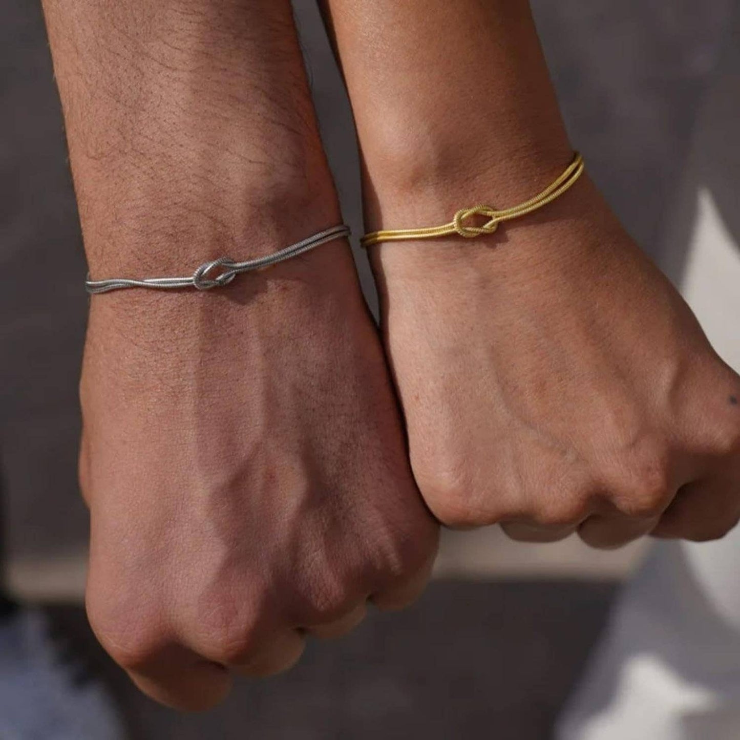 Brass love knot snake bone bracelet