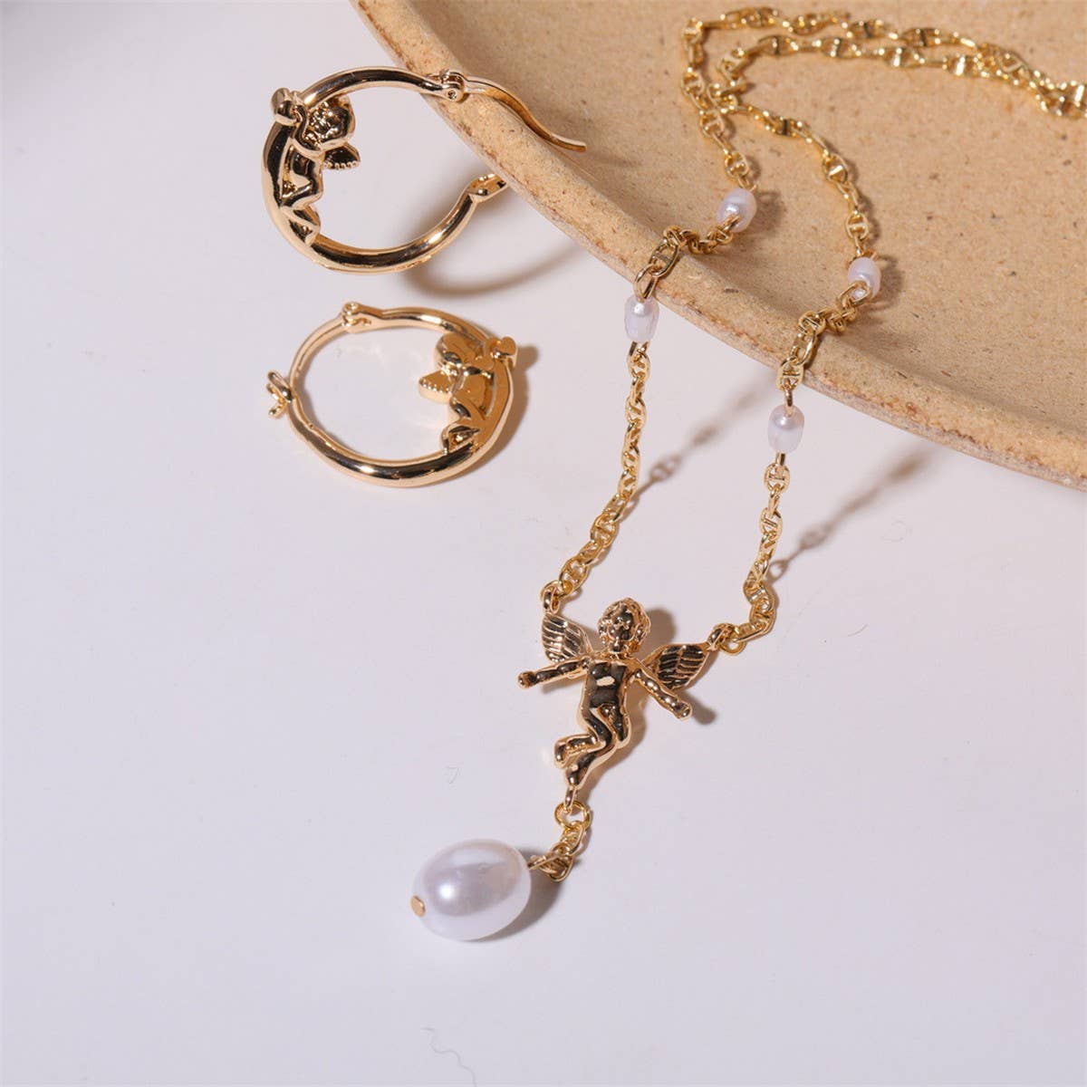 Sweet Cupid Pearl Bow Compass Dangle Earrings