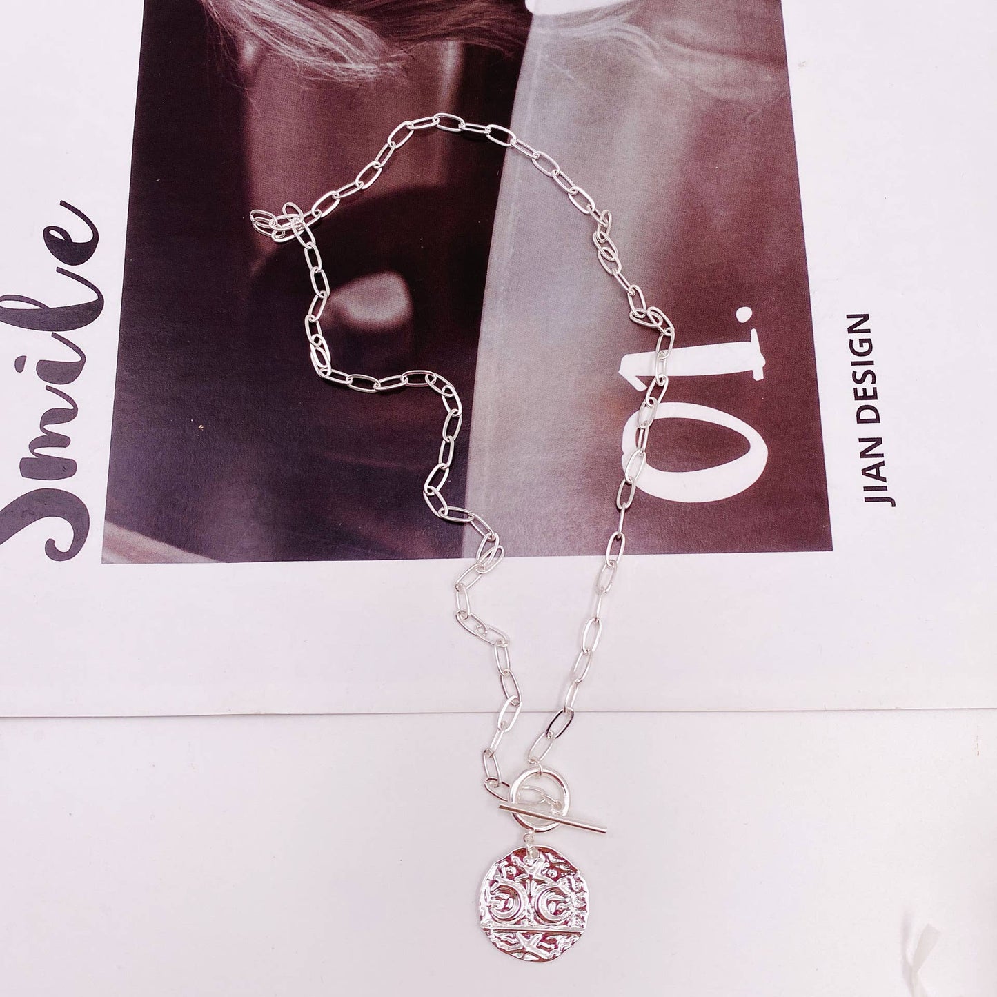 Gold Medal Moon and Star Pendant necklace
