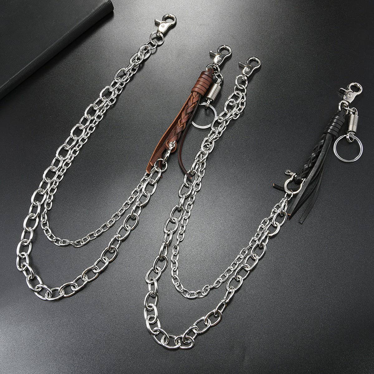 FASHIONABLE COWHIDE BRAIDED TASSEL PANTS CHAIN
