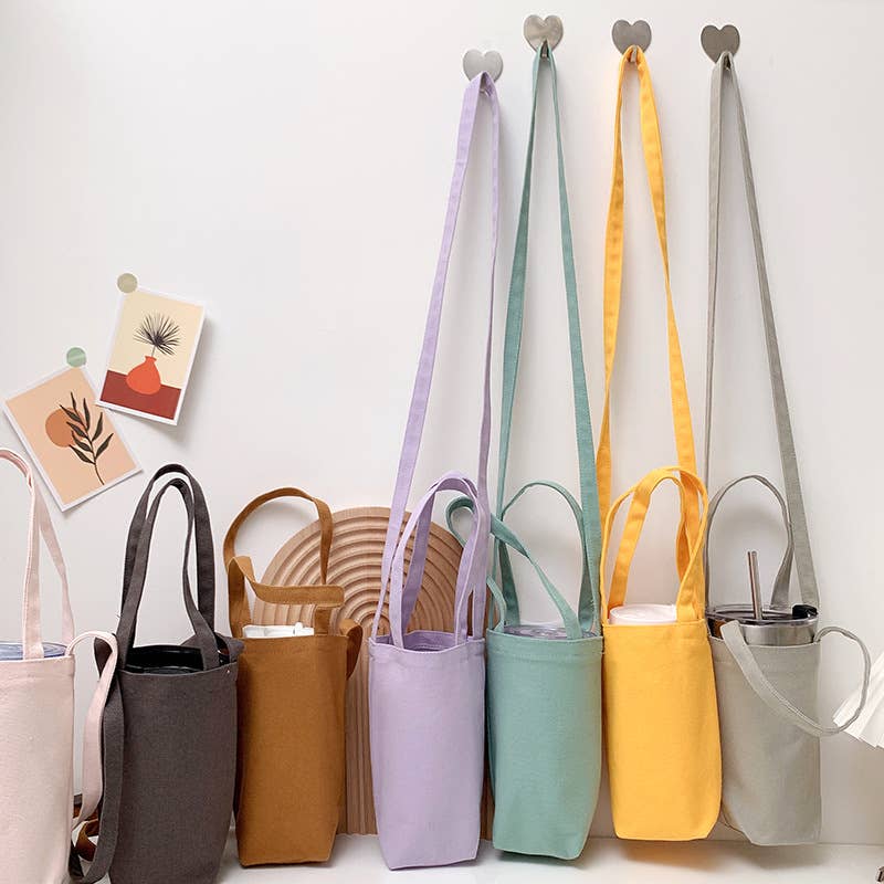 Portable and portable slanting water cup bag