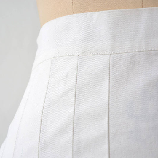VERSATILE SOLID COLOR PLEATED SHORT SKIRT