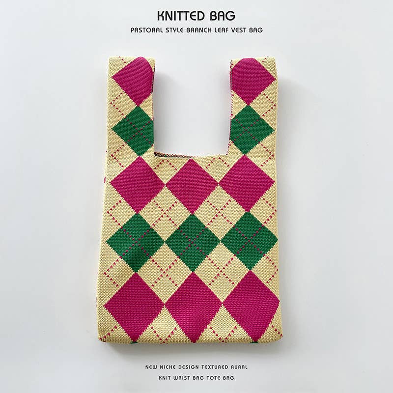 Heart-shaped color-blocked knitted handbag