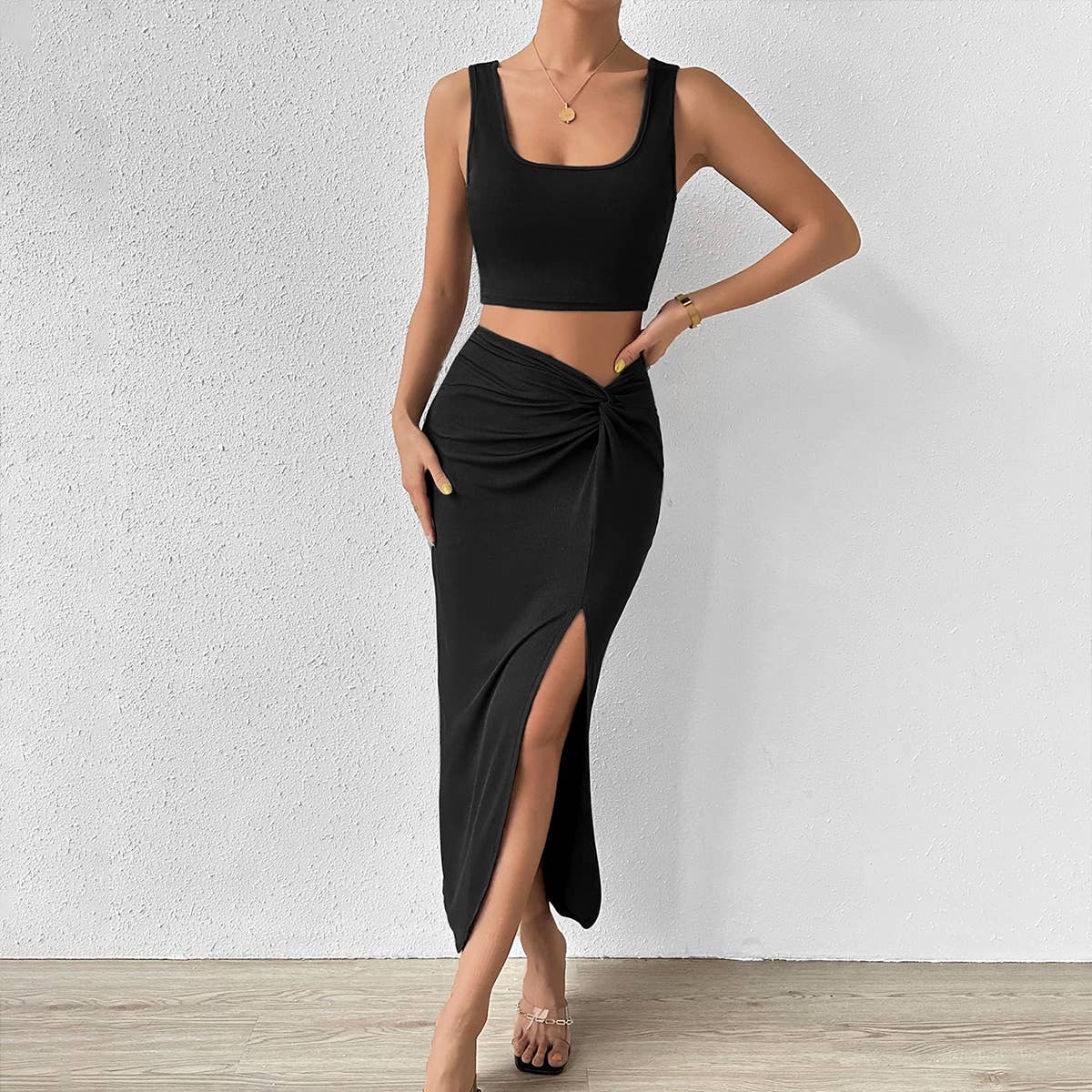 A two-piece solid color sleeveless vest skirt