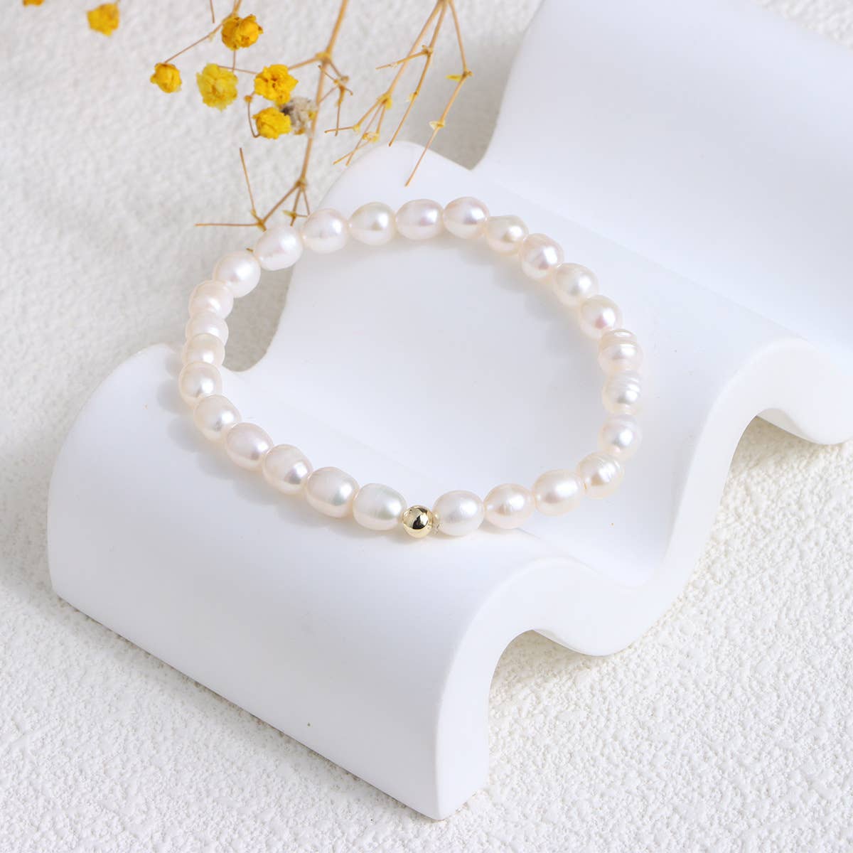 Freshwater pearl bracelet made of broken silver