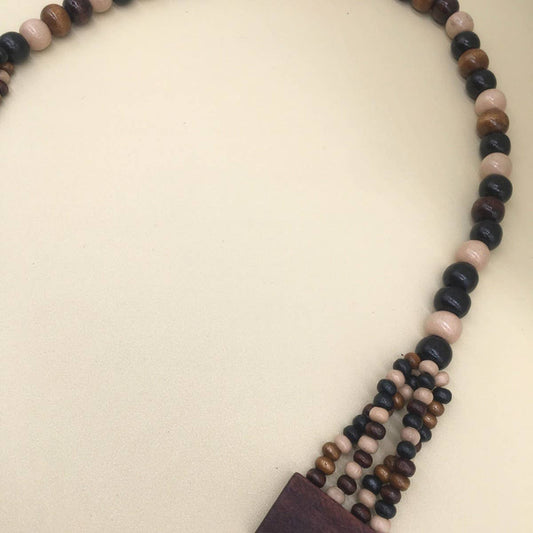MULTI-LAYERED GEOMETRIC WOODEN BEAD NECKLACE