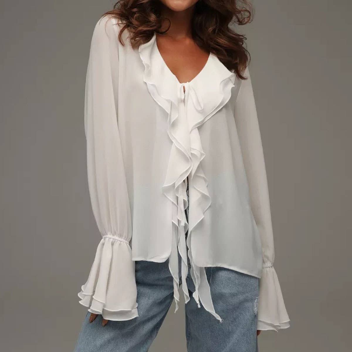 A stylish lace-up design with ruffled cardigan
