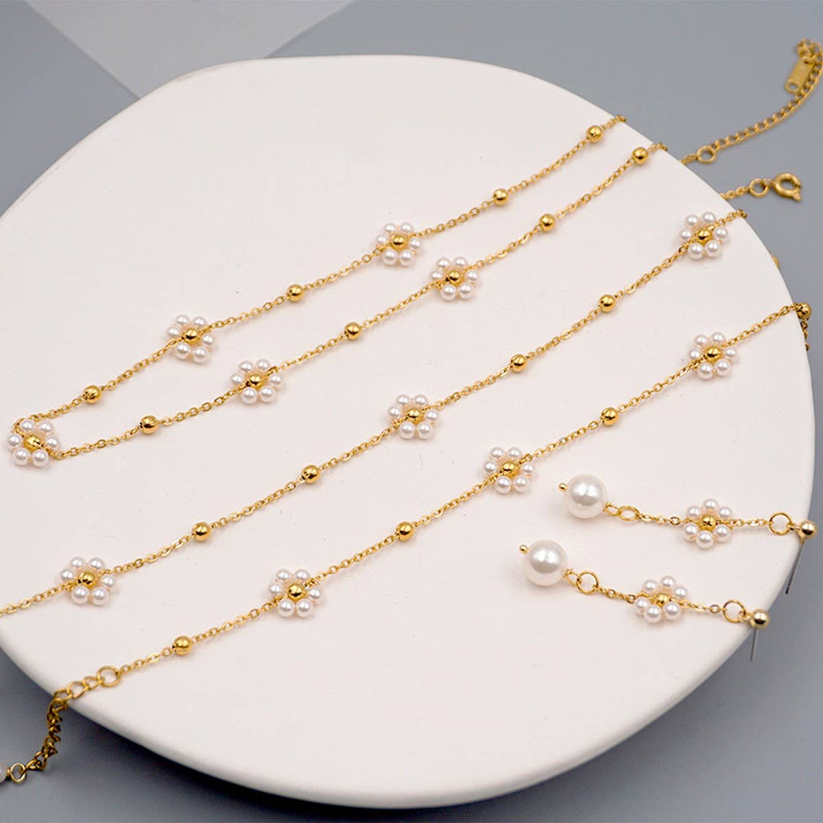 SMALL FLOWER PEARL BRACELET SET_CWAJE1668