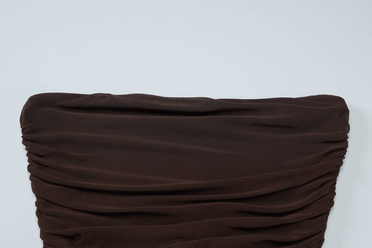 A strapless pleated patchwork gauze dress