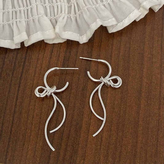 FASHIONABLE HIGH-GRADE METAL BOW PENDANT EARRINGS