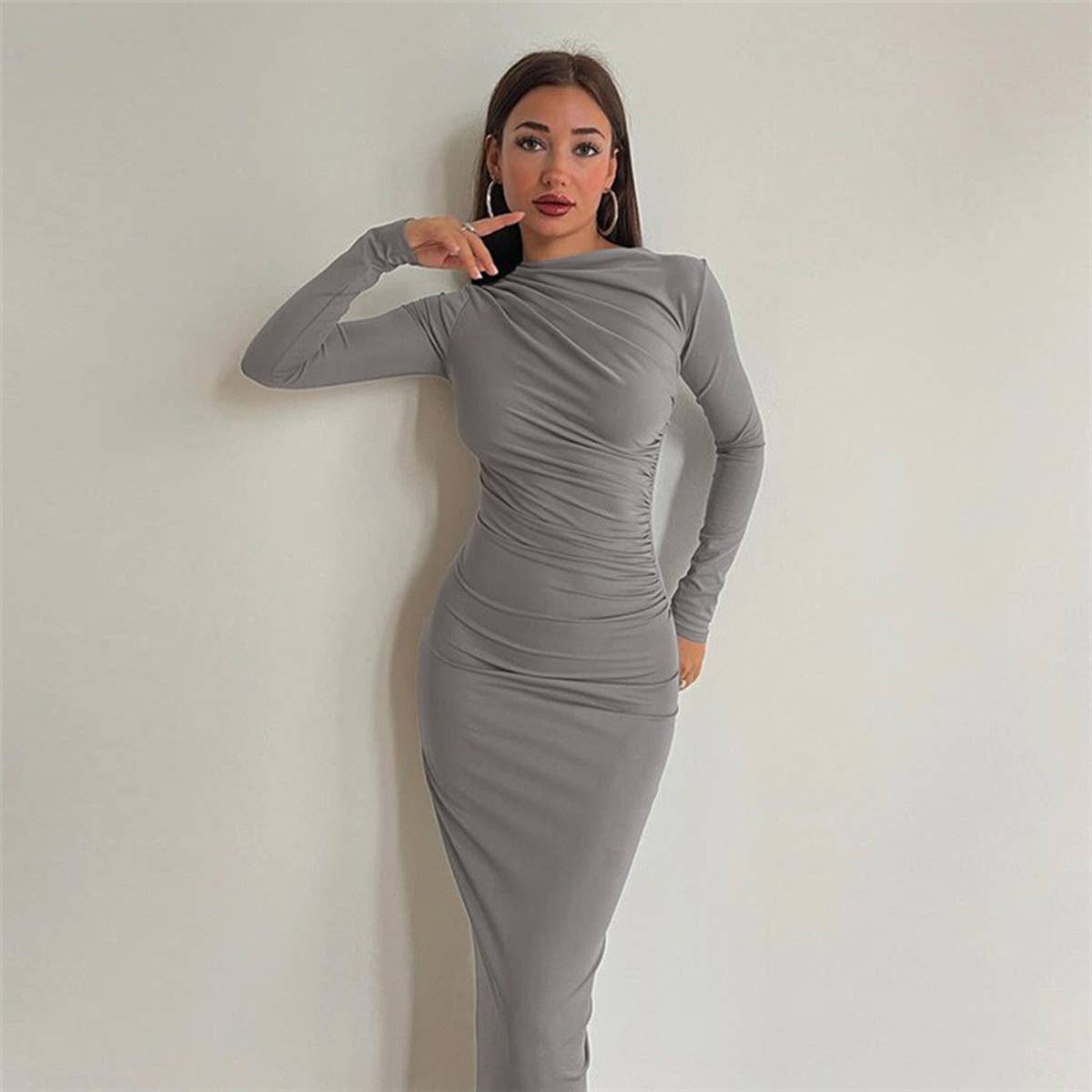 Form-fitting solid color body-hugging dress