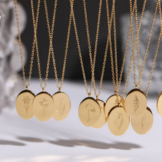 GOLD STAINLESS STEEL DECEMBER FLOWER NECKLACE