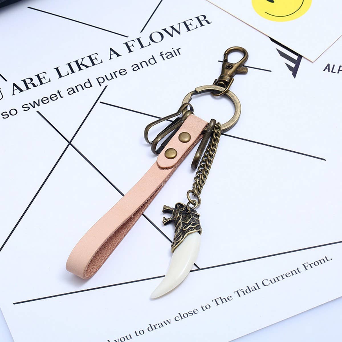 RESIN WOLF TOOTH VINTAGE COWHIDE KEYCHAIN_CWMM5028