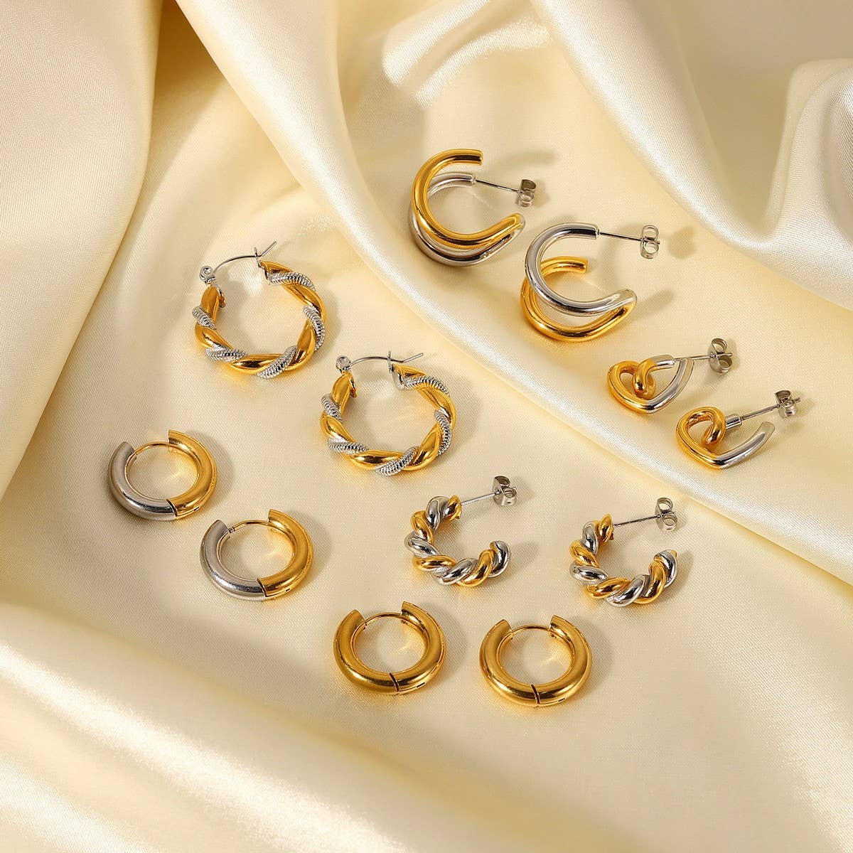 FASHIONABLE GOLD AND SILVER PLATED EARRINGS