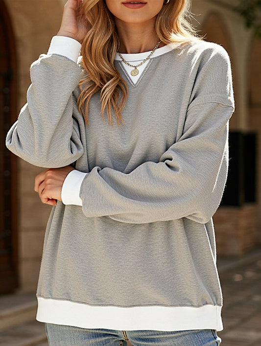 Contrast color splicing round neck sweater