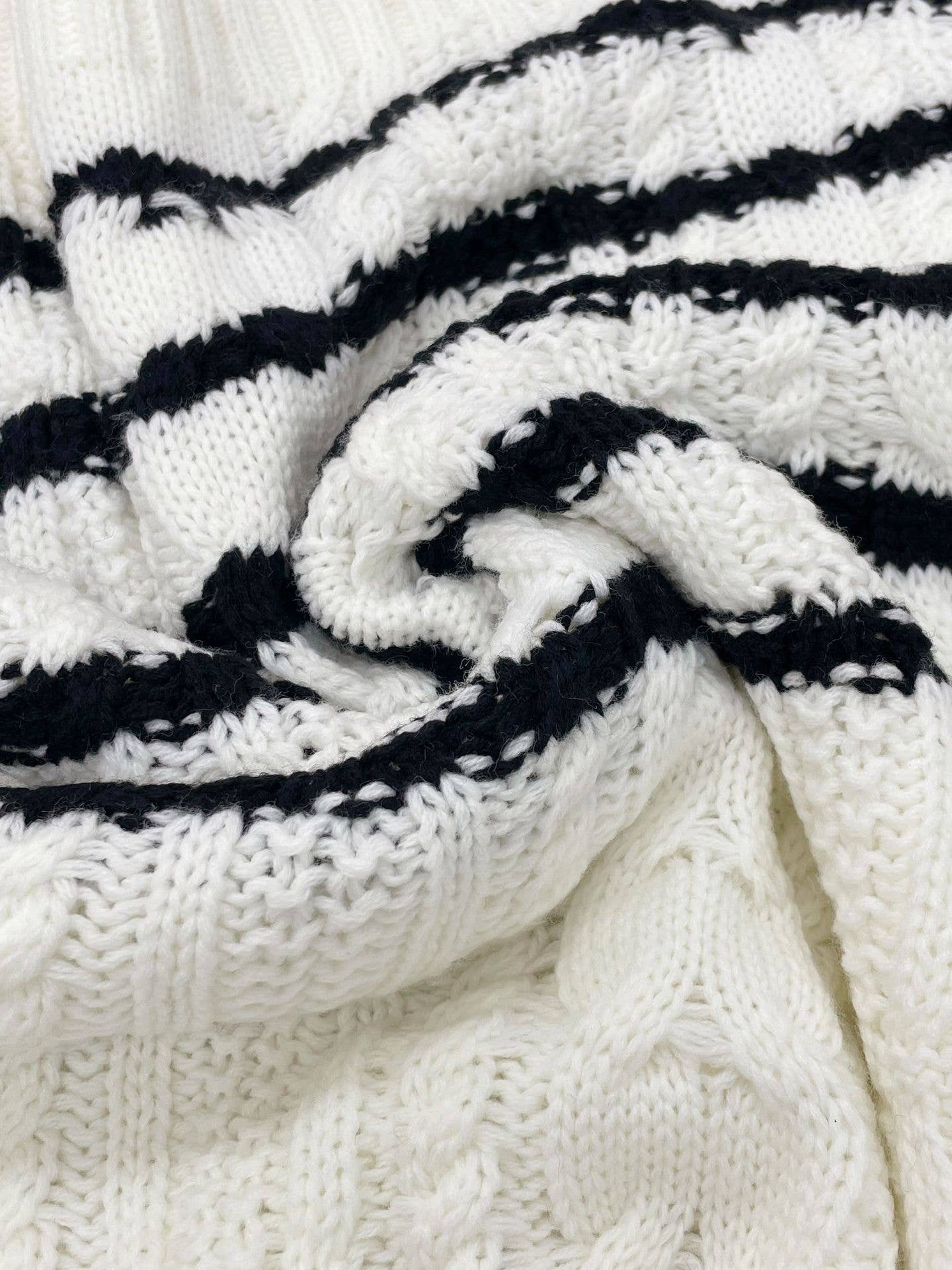 Buttons embellished with striped twist sweaters