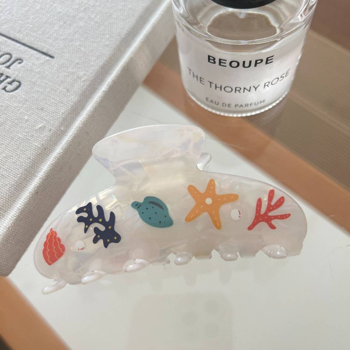 CWAHA07745_ACETATE STARFISH OCEAN SHARK HAIR CLAW CLIP