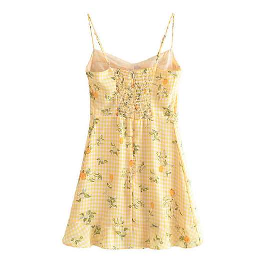 A strappy dress with floral prints and ruffles