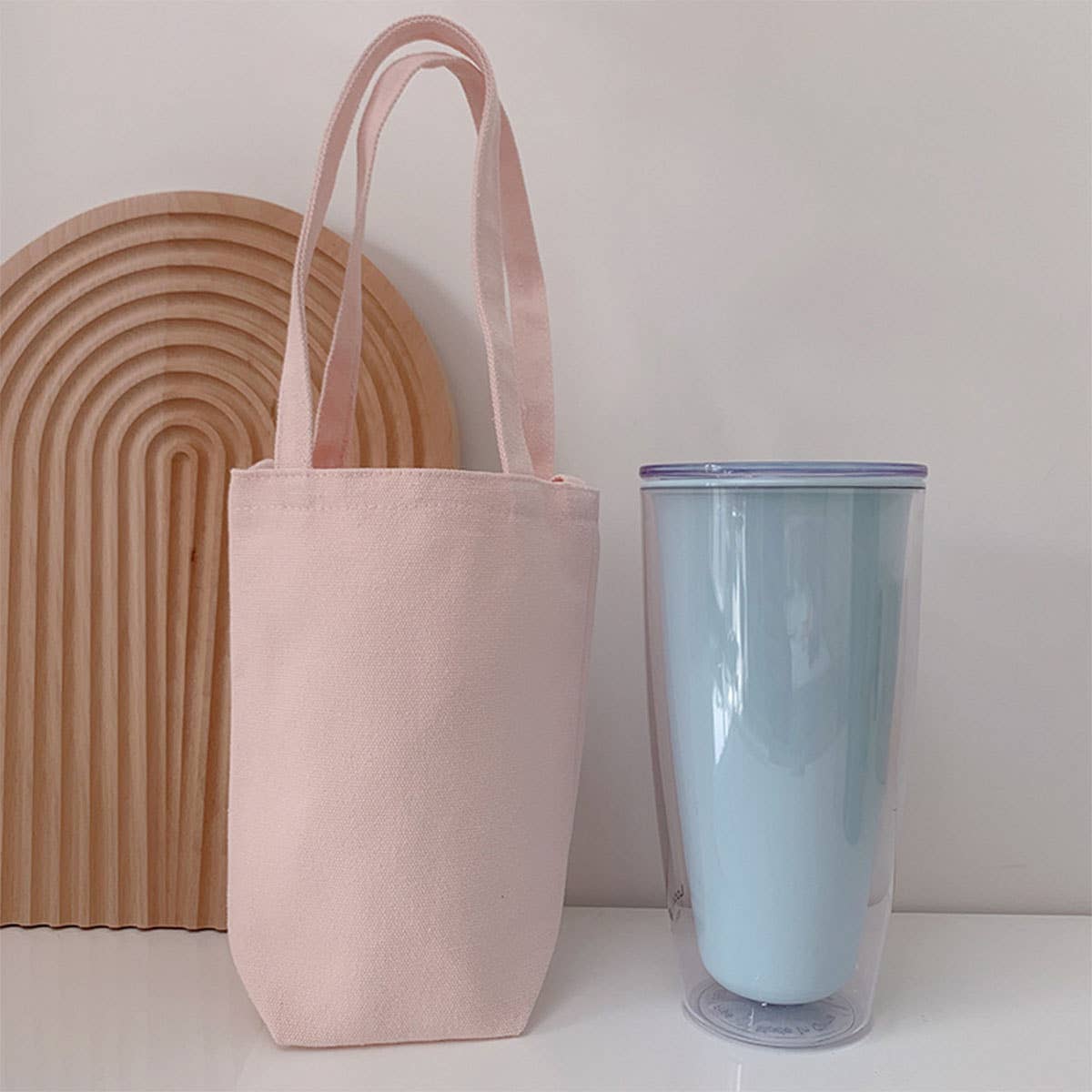 Portable and portable slanting water cup bag