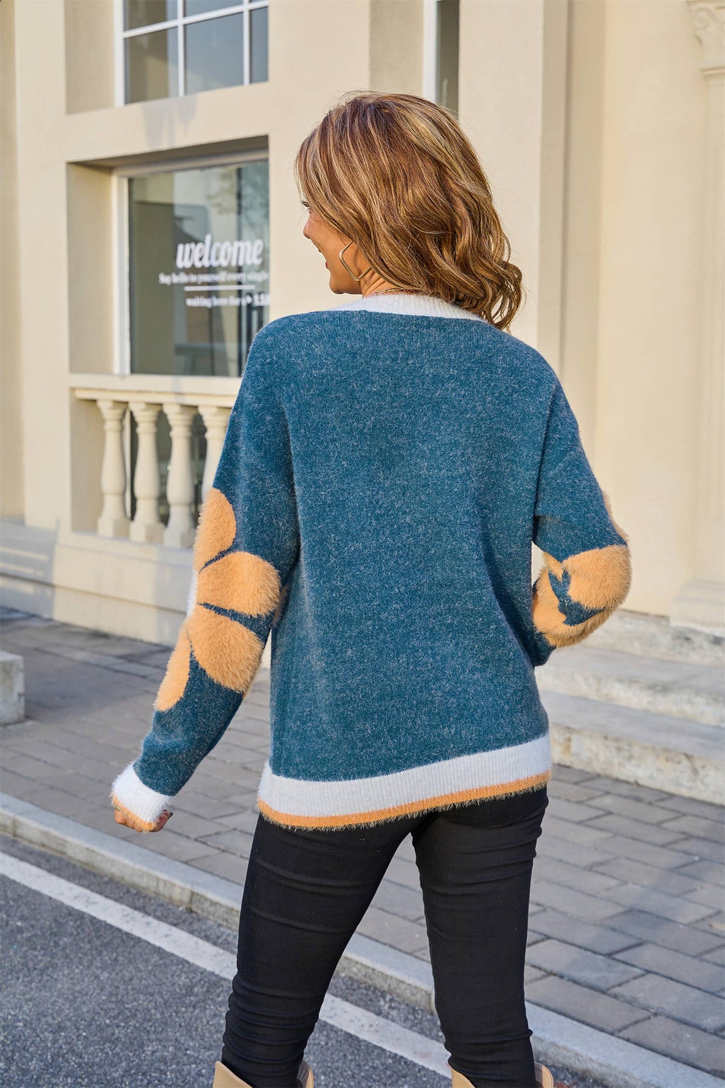 Flower-patterned knitted round-neck sweater