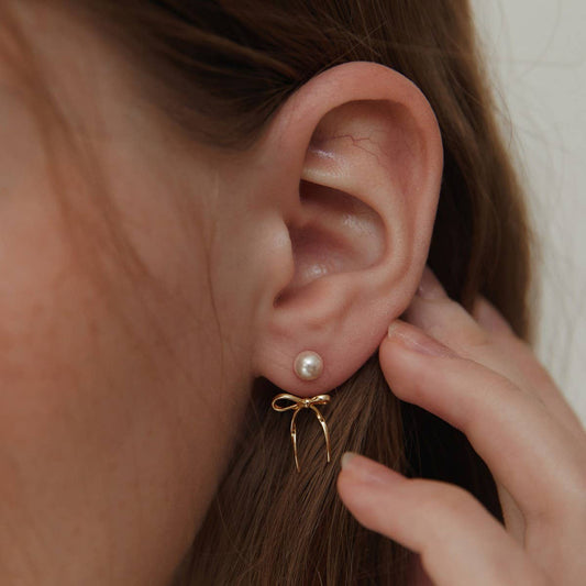 Sweet and elegant pearl bow earrings