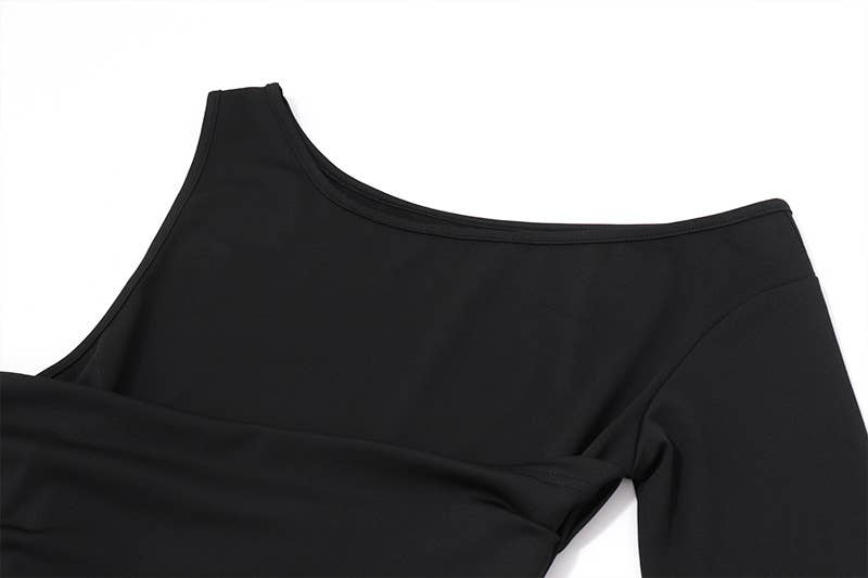 A solid-color fitted knitted top