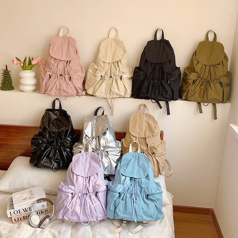 Fashionable pleated large-capacity flip schoolbag