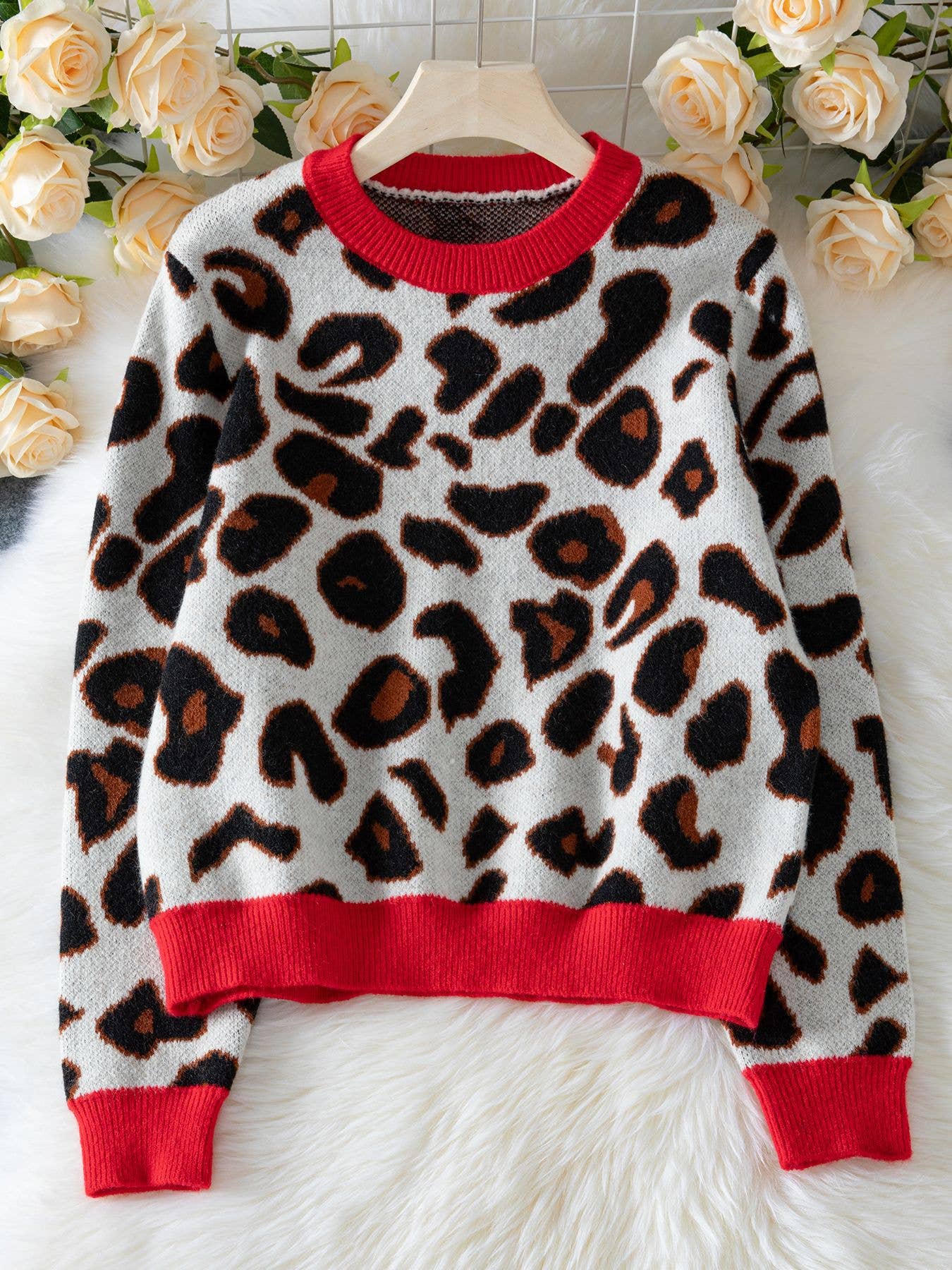 Color-blocking leopard jacquard knitted sweater