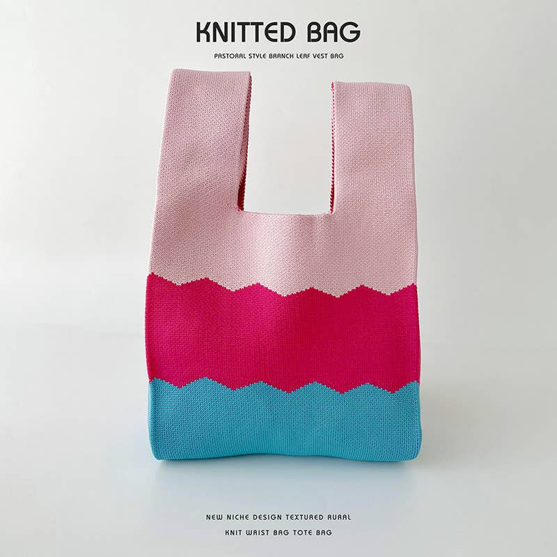 Heart-shaped color-blocked knitted handbag