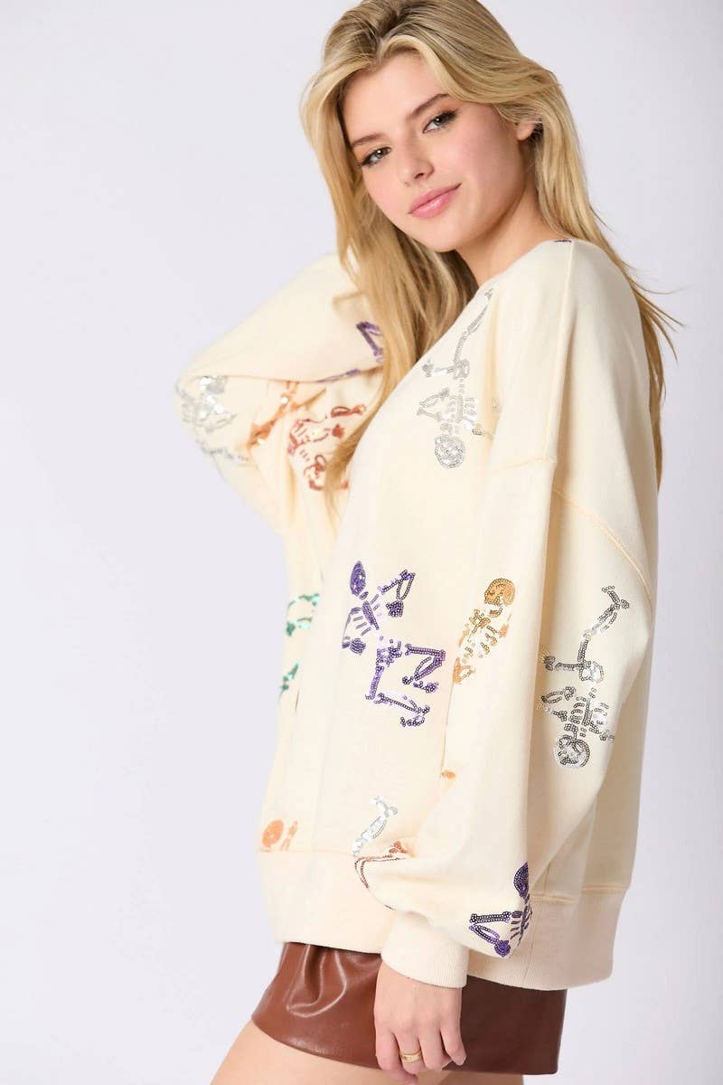 CWTBLL01228_HALLOWEEN SKULL SEQUINED SWEATSHIRT