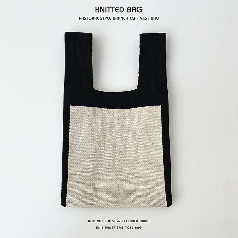 Heart-shaped color-blocked knitted handbag