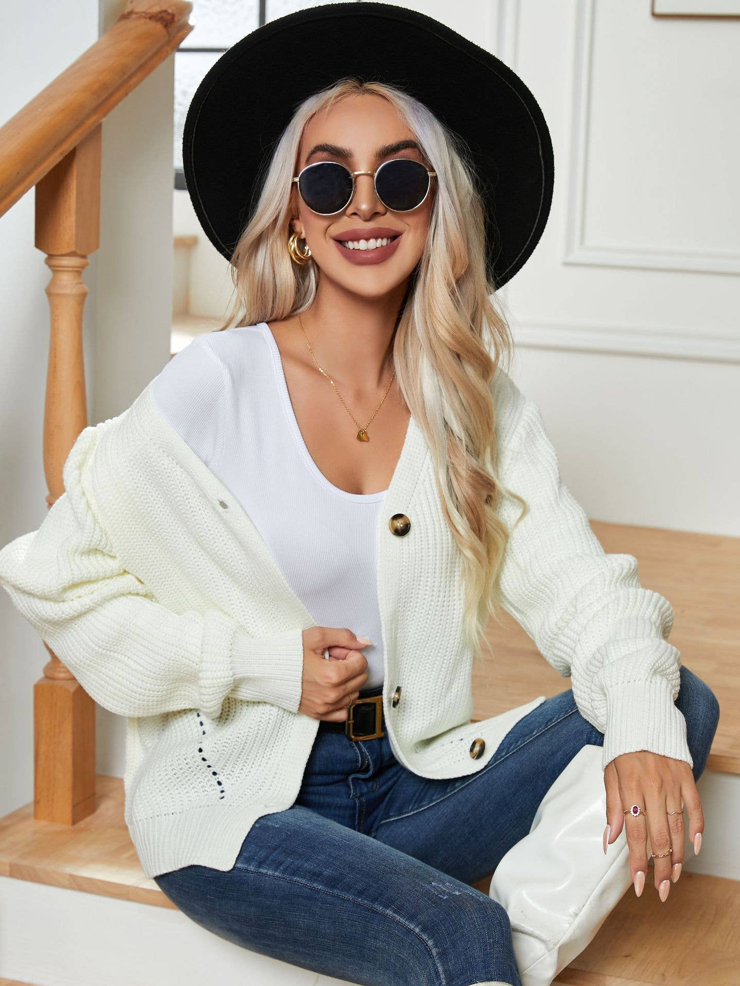 CUT-OUT SINGLE BREASTED CARDIGAN SWEATER