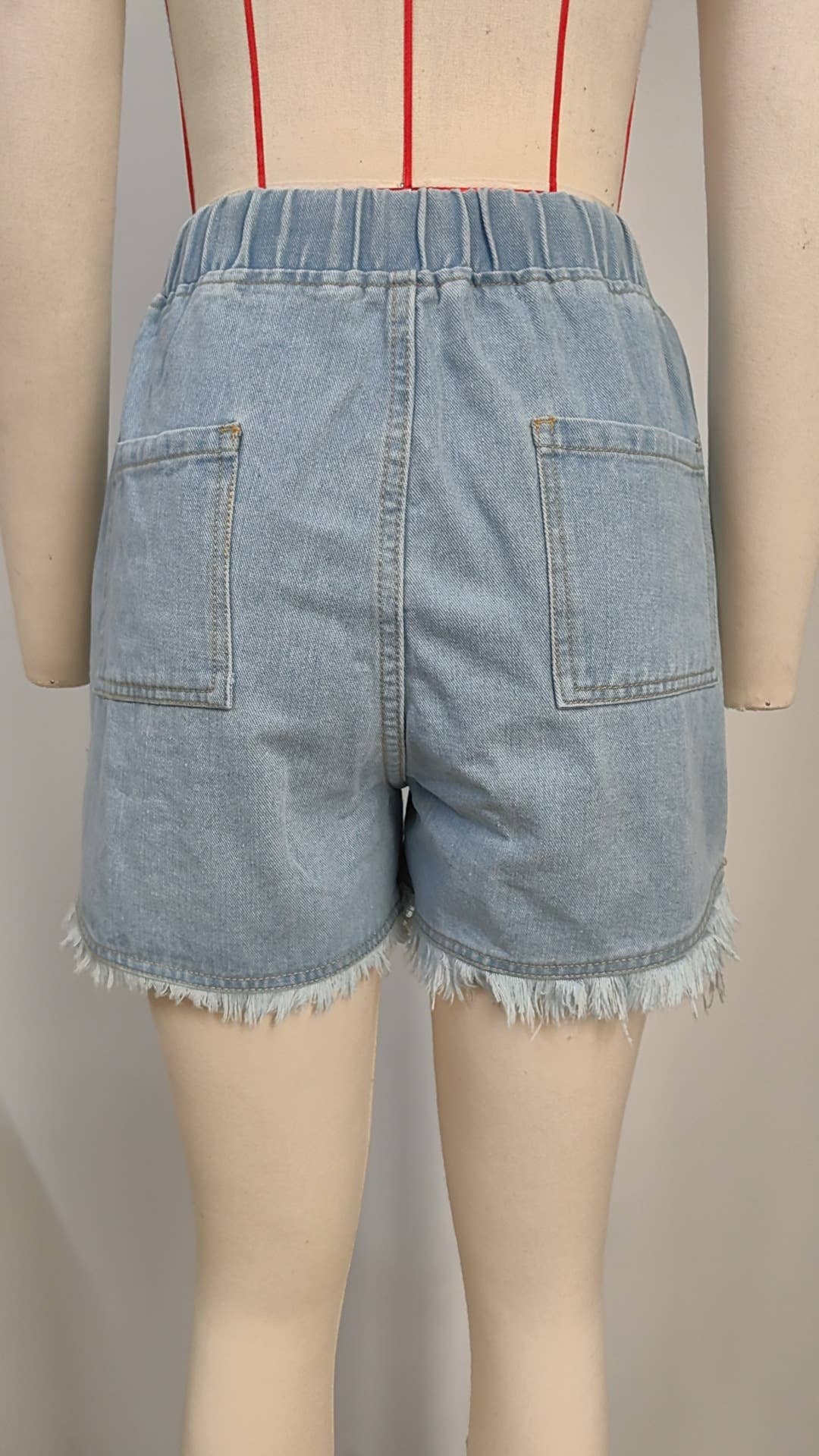 ELASTIC-WAISTED DRAWSTRING RAW HEM DENIM SHORTS