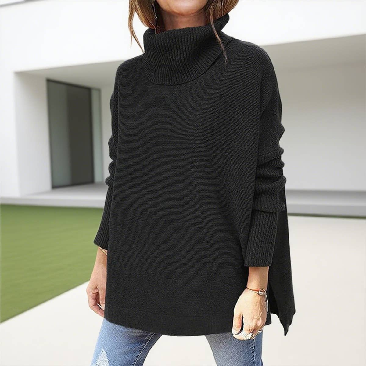 Bat sleeves and a cinched waist pullover sweater