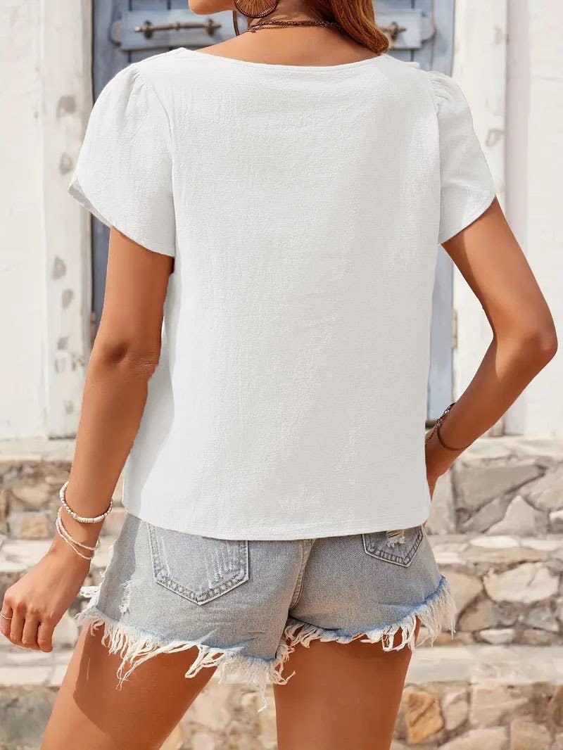 Form-fitting knit short-sleeved slant-neck top
