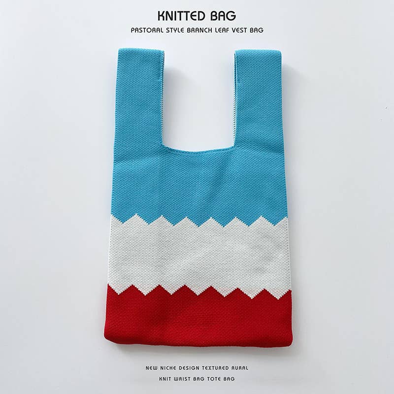 Heart-shaped color-blocked knitted handbag