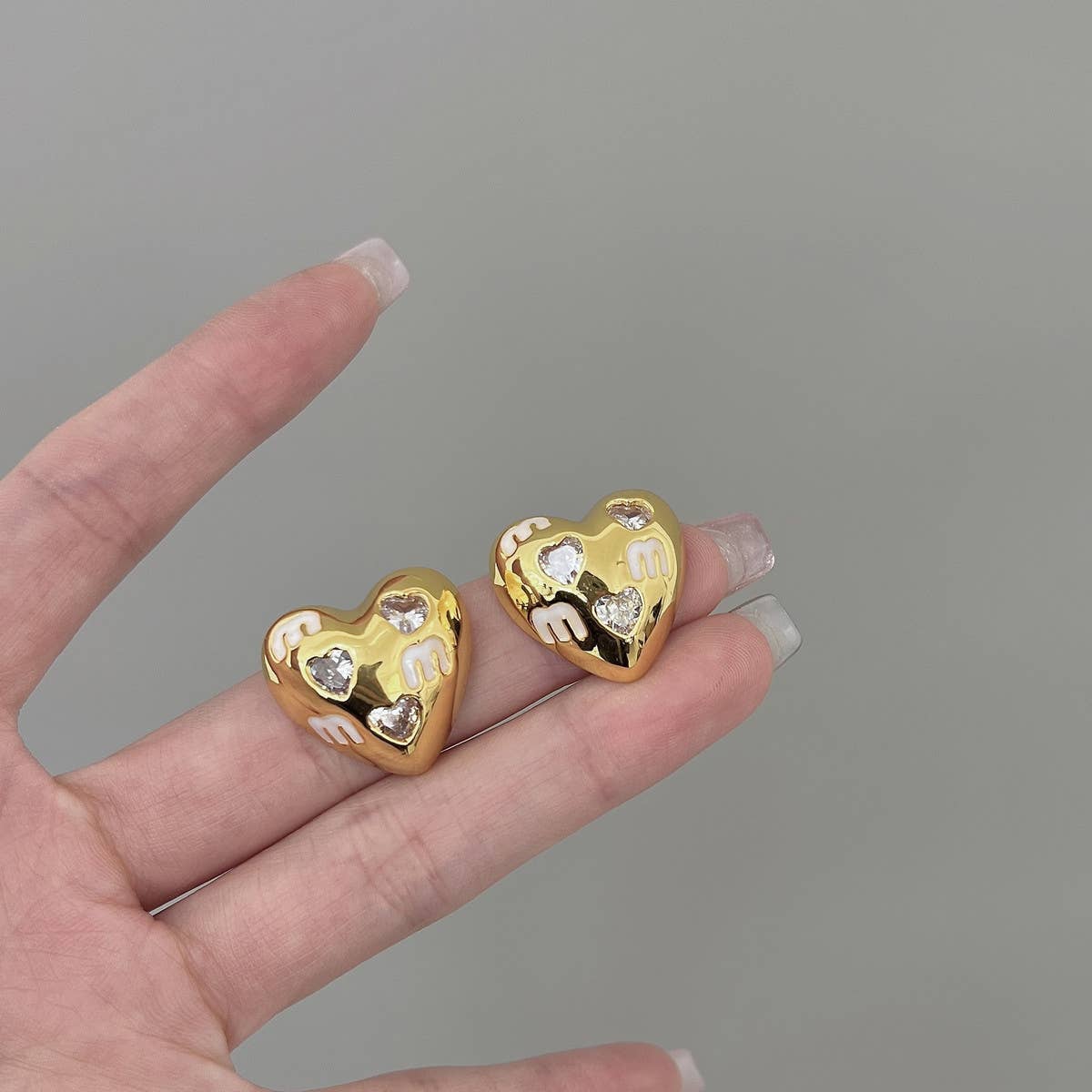 HALF FACE THREE-DIMENSIONAL EARRINGS