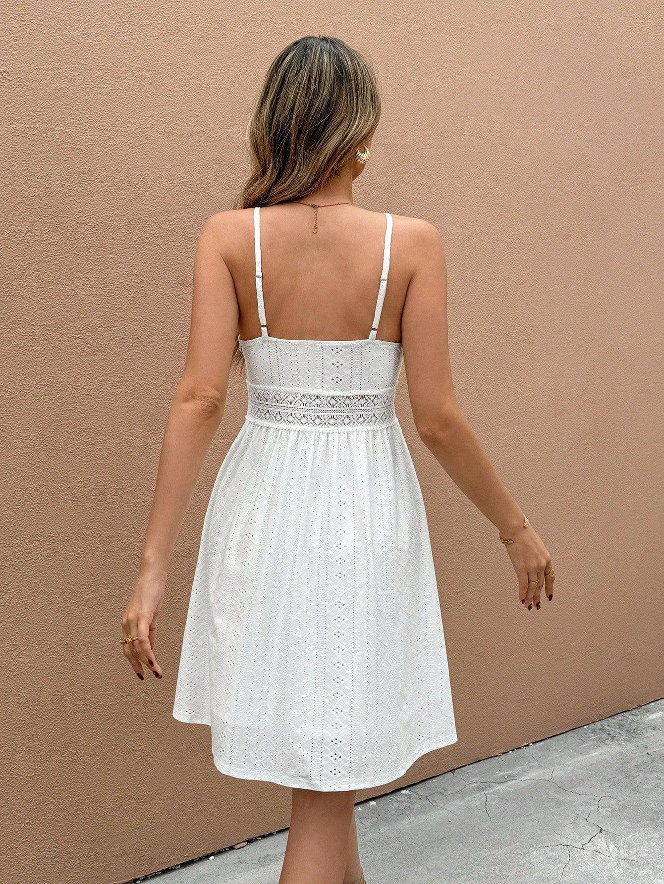 A solid color halter V-neck cinched waist dress