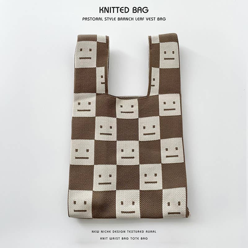 Heart-shaped color-blocked knitted handbag