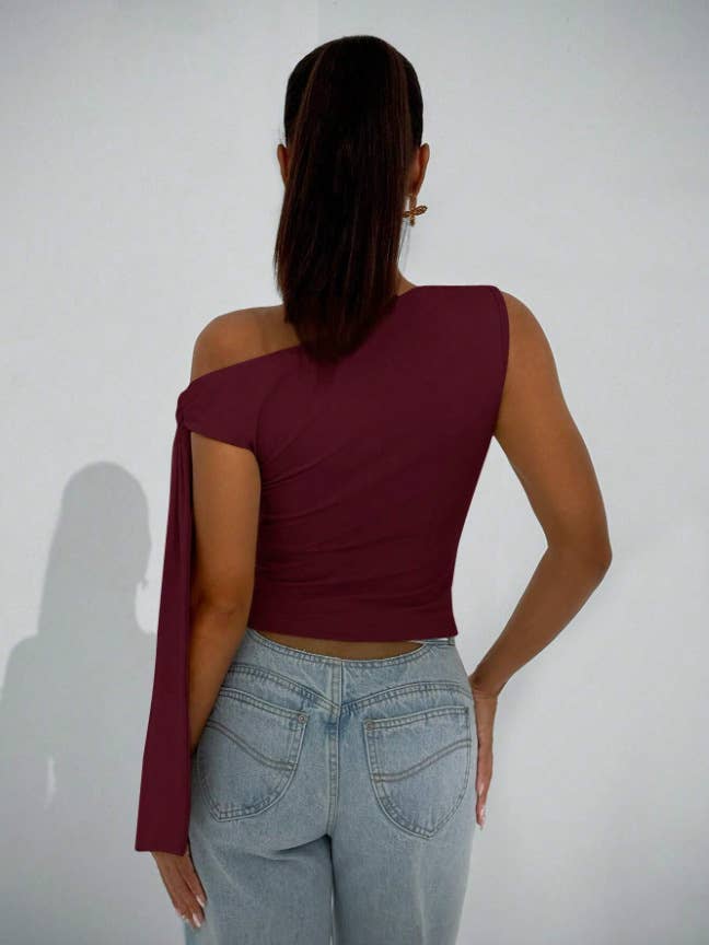 Body-hugging, ribbon-tied, diagonal tie,top