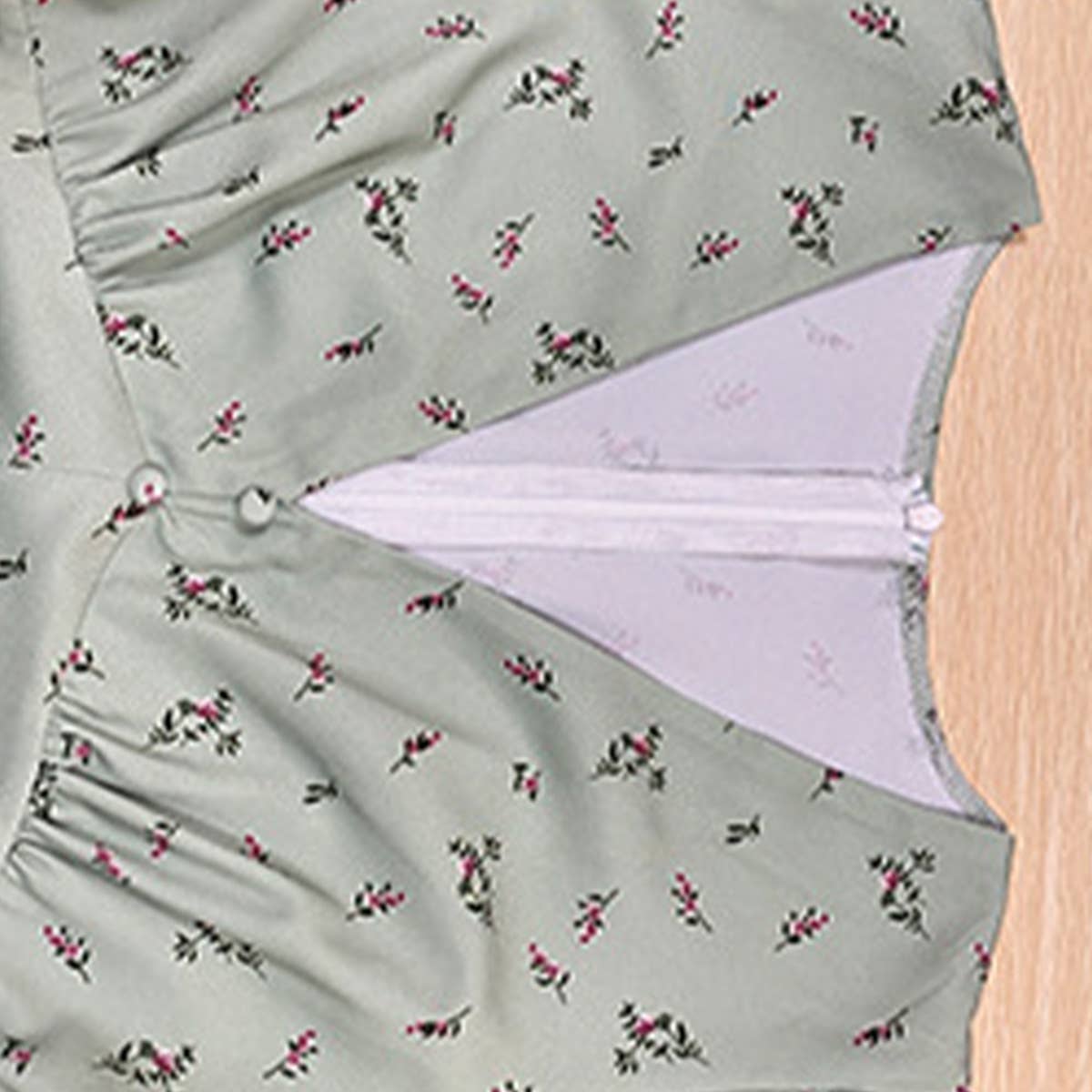 FLORAL DRESS WITH PRINTED BUTTON WAIST